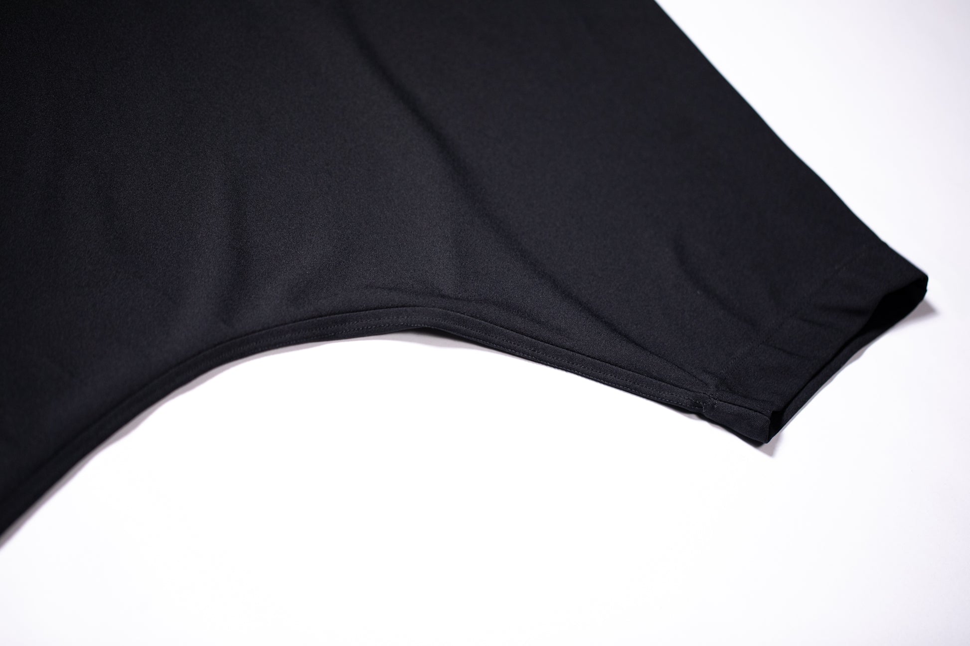 Batwing Oversized Tee front view sleeve detail by Versant Studios lay flat